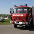 Twin und Feuerwehrfahrzeug vor unserer Tankstelle